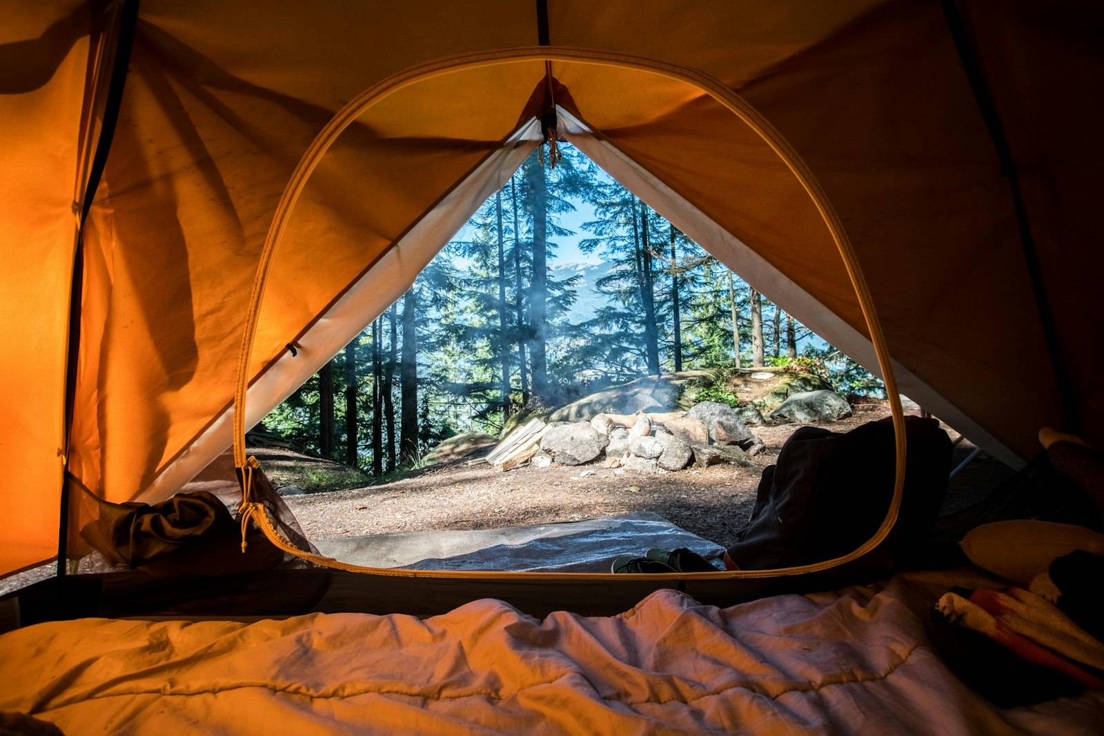 Tent at a forest campsite at dusk