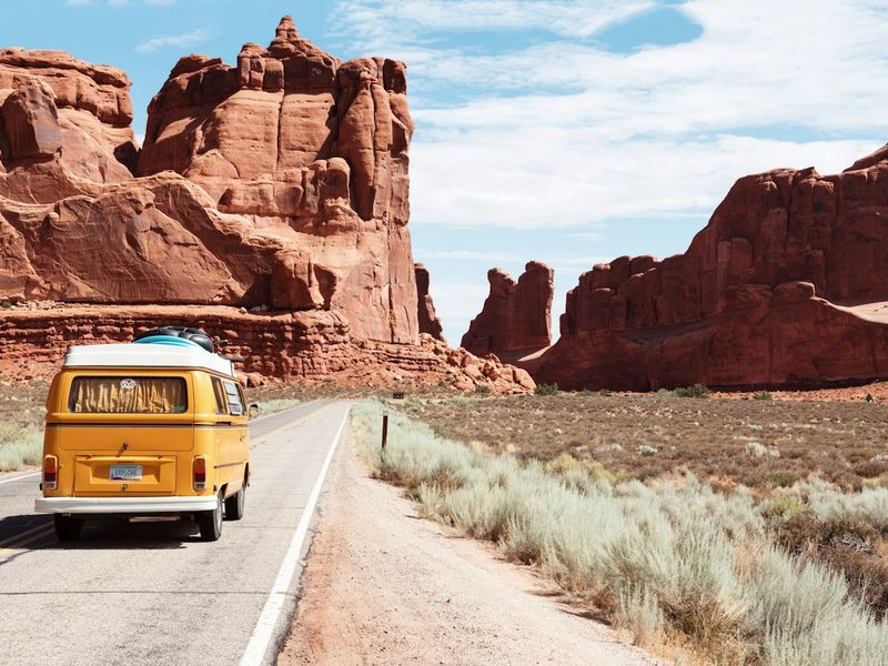 RV navigating a narrow mountain road